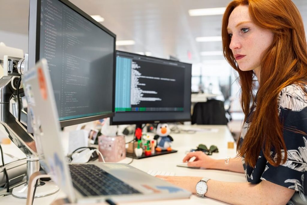 Image represents a women performing an SEO Crawlability test